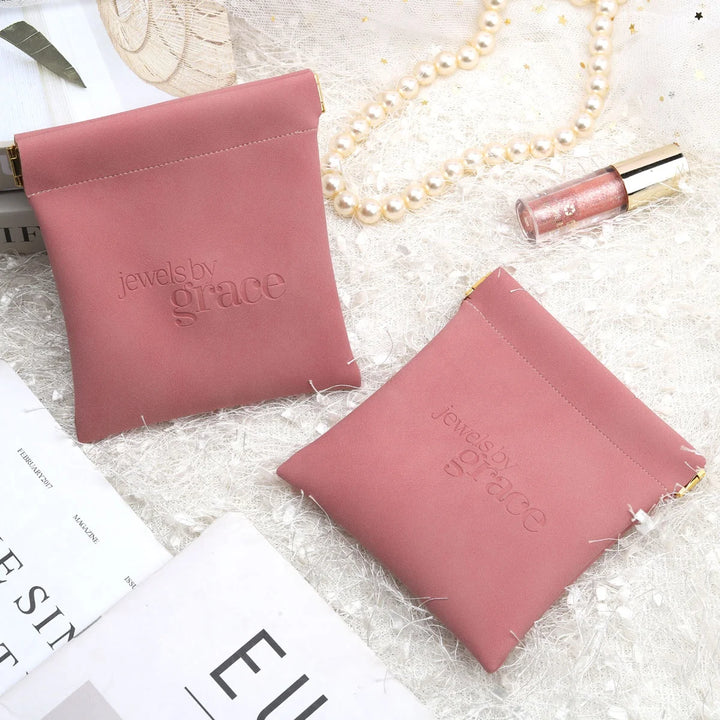 500pcs Wholesale Luxury PU Leather Spring Closure Jewelry Pouches – Custom Embossed Logo Boutique Packaging for Rings & Necklaces