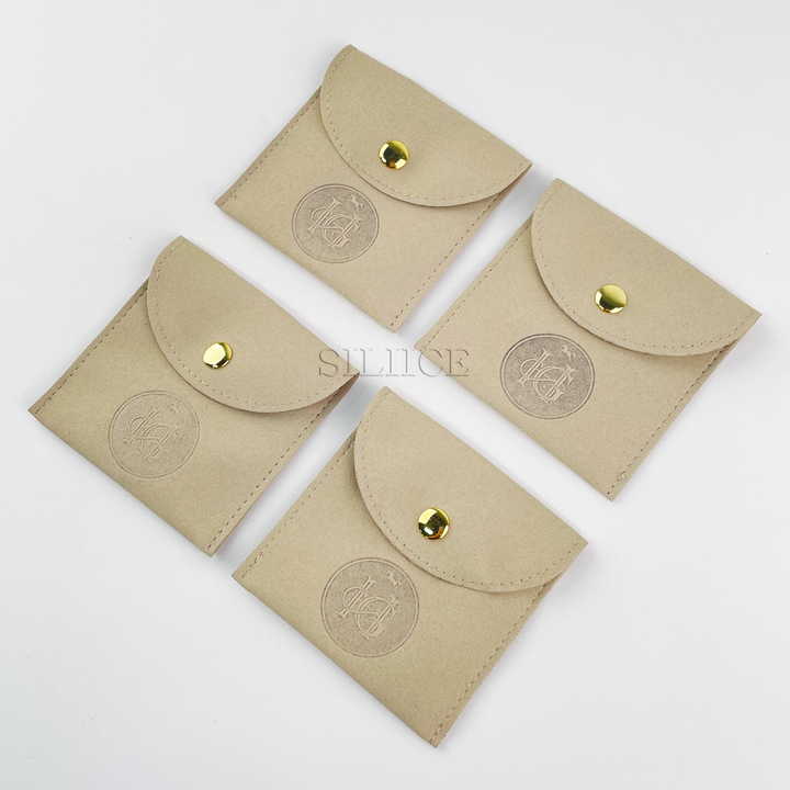 100pcs Custom Logo Debossed Round Top Microfiber Jewelry Pouches with Button Closure – Wholesale Packaging for Rings, Earrings, Bracelets & Gifts