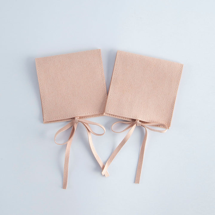 100pcs Wholesale Christmas Special Edition Microfiber Ribbon Closure Jewelry Pouches – Envelope-Flap Design with Embossed Christmas Pattern