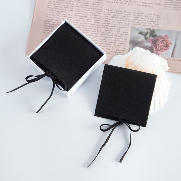 100pcs Wholesale Christmas Special Edition Microfiber Ribbon Closure Jewelry Pouches – Envelope-Flap Design with Embossed Christmas Pattern