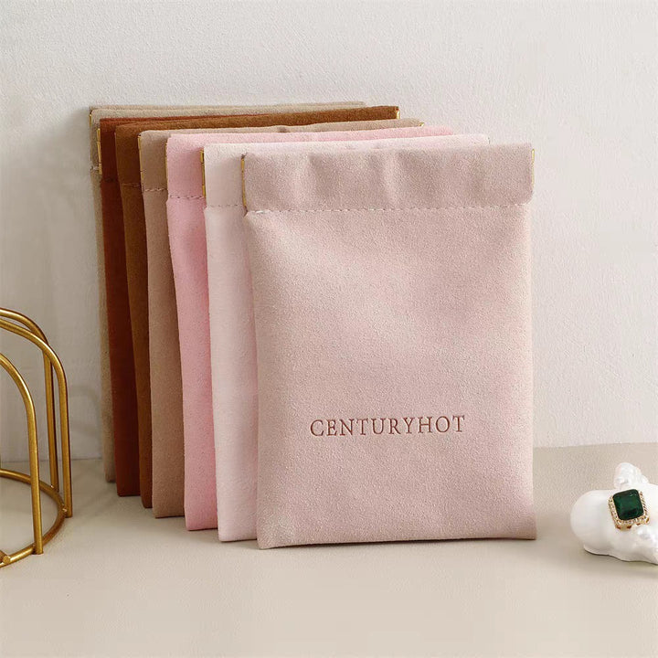 100pcs Wholesale Luxury Microfiber Spring Closure Pouches – Embossed Logo Jewelry & Retail Packaging