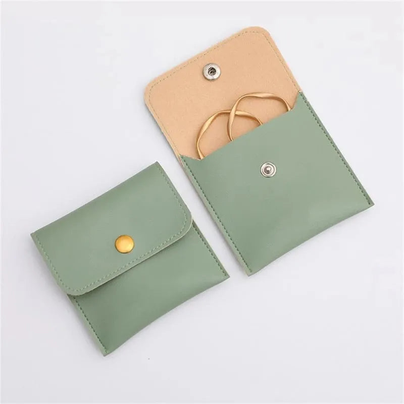 100pcs Wholesale Custom Faux Leather Jewelry Pouches – PU Gift Bags with Snap Button & Logo for Rings, Earrings & Necklaces
