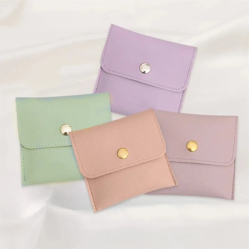 100pcs Wholesale Custom Faux Leather Jewelry Pouches – PU Gift Bags with Snap Button & Logo for Rings, Earrings & Necklaces