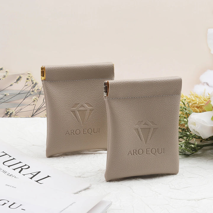 100pcs Wholesale Luxury PU Leather Magnetic Jewelry Pouches – Custom Embossed Logo Boutique Packaging for Rings & Necklaces