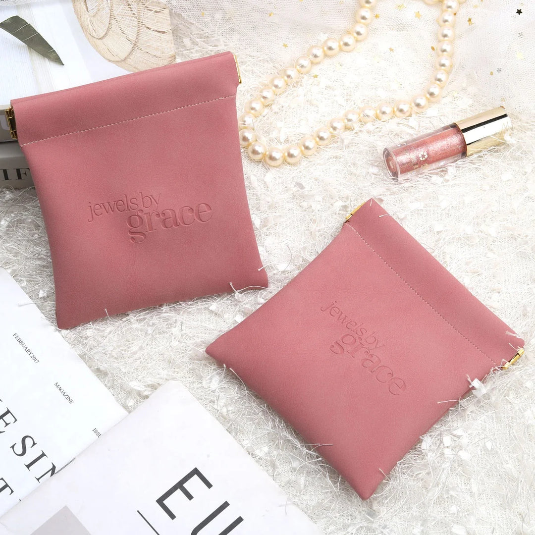100pcs Wholesale Luxury PU Leather Magnetic Jewelry Pouches – Custom Embossed Logo Boutique Packaging for Rings & Necklaces