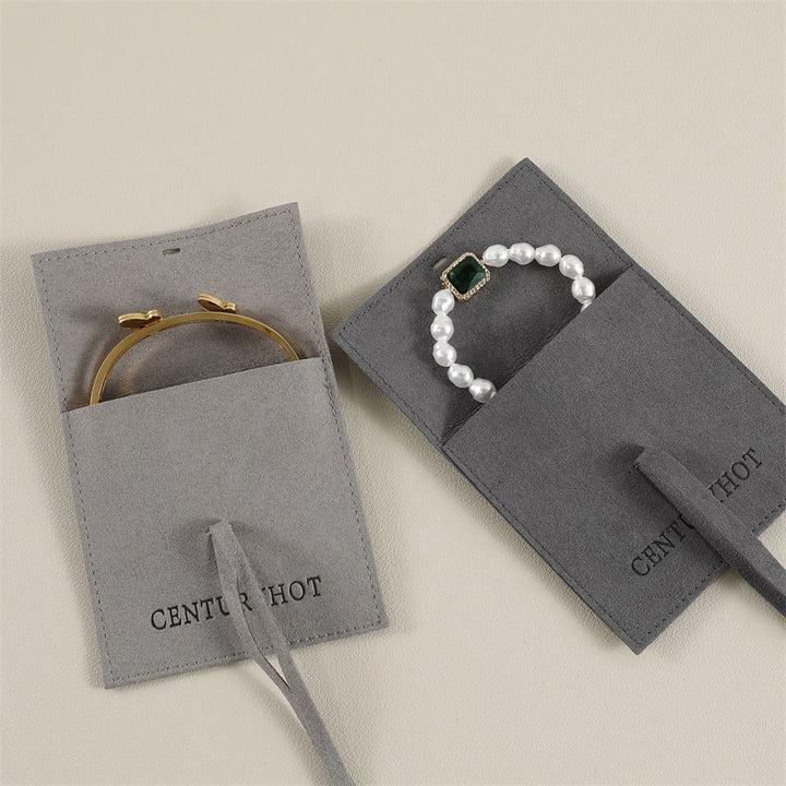 100pcs Custom Microfiber Jewelry Pouch – Envelope-Style with Strap Closure & Custom Logo for Rings, Earrings & Necklaces Wholesale
